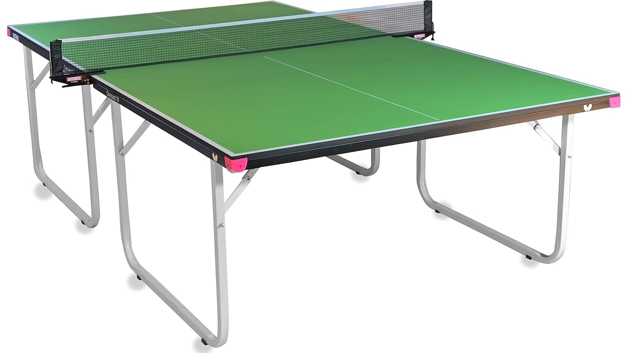 Foldable regulation size green ping pong table with wheels and detachable net.